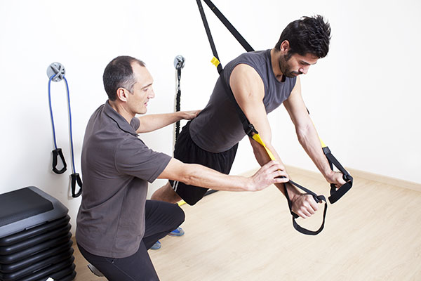 fisioterapeuta ejercicio terapéutico rehabilitación deportiva Fidoos Madrid