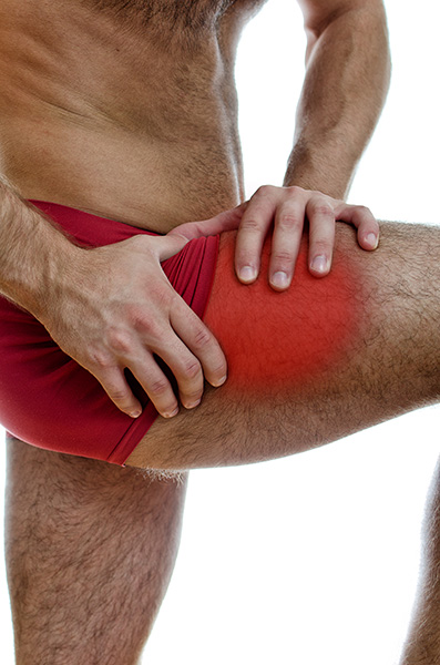 contractura muslo cuádriceps fisioterapia deportiva Fidoos Vallecas Madrid
